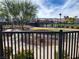 Fenced dog park with grassy areas and benches at 12369 Golden Wreath Rd # 2, Las Vegas, NV 89183