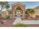 Home exterior with stone accents and a double front door at 8420 Lake Tahoe View Ct, Las Vegas, NV 89143