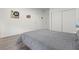 Serene bedroom with a gray comforter and ample closet space at 3353 E Rochelle Ave, Las Vegas, NV 89121