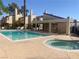 Community pool and spa with covered patio area at 5039 Spencer St # D, Las Vegas, NV 89119