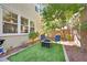 Small backyard with artificial turf and fire pit at 10636 Lomaland Ave, Las Vegas, NV 89166