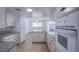 Kitchen with white cabinets, granite countertops, and stainless steel appliances at 2013 Granite Ave, Las Vegas, NV 89106