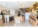 Modern kitchen with white cabinets and an island at 3949 S Torrey Pines Dr, Las Vegas, NV 89103