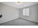 Simple bedroom with neutral wall colors and carpeted floor at 6223 Hamilton Ave, Las Vegas, NV 89122