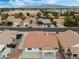 Aerial view of house with desert landscape and distant mountain range at 5301 Clouds Rest Ave, Las Vegas, NV 89108