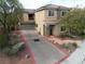 Two story house with driveway and landscaping at 2691 Benton Cove St, Laughlin, NV 89029