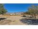 Landscaped backyard with mountain views at 3721 S Sagebrush Ave, Pahrump, NV 89048