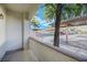 Private patio with view of parking and community at 5650 E Sahara Ave # 1065, Las Vegas, NV 89142