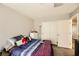 Bedroom with double bed, dresser, and closet at 7745 Donner Peak St, Las Vegas, NV 89166