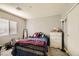 Bright bedroom with double bed and a dresser at 7745 Donner Peak St, Las Vegas, NV 89166