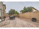 Spacious backyard patio with dining set and stone flooring at 922 Harbor Ave, Henderson, NV 89002