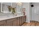 Spa-like bathroom with double vanity, large mirrors, and modern finishes at 476 Morro Strand Ave, Las Vegas, NV 89138