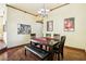 Bright dining room with hardwood floors and chandelier at 8371 Las Lunas Way, Las Vegas, NV 89129