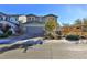 Two-story house with gray siding, gray garage door, and landscaping at 2832 Aragon Terrace Way, Henderson, NV 89044