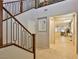 Modern staircase with metal and wood railings leading to the second floor at 2832 Aragon Terrace Way, Henderson, NV 89044