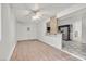 Breakfast nook with laminate wood flooring and kitchen view at 3825 Pink Frost Dr, North Las Vegas, NV 89032