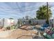 Relaxing backyard oasis featuring a covered patio and lush landscaping at 620 N 16Th St, Las Vegas, NV 89101