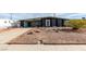 Ranch style home with a carport and a well-maintained front yard at 620 N 16Th St, Las Vegas, NV 89101