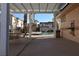 View of the community pool from under a pergola at 71 Belle Soleil Ave, Las Vegas, NV 89123