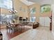 Open dining area with a rustic wood table and metal chairs at 10078 Ivy Patch St, Las Vegas, NV 89183