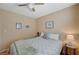 Serene bedroom with a ceiling fan and window at 7321 Halsey Ct, Las Vegas, NV 89129