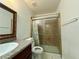 Bathroom with tiled shower and granite countertop at 3573 Arville St # 601A, Las Vegas, NV 89103