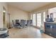 Casual dining area with glass table and four gray chairs at 2192 Wagonwheel Ave, Las Vegas, NV 89119