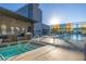 Rooftop pool and hot tub with lounge chairs at 3722 Las Vegas Blvd # 2509, Las Vegas, NV 89158