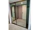 Mirrored sliding door closet with neutral carpet flooring at 3578 Newland Ave, Las Vegas, NV 89121