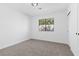 Bright bedroom with neutral walls and carpet flooring at 602 Otono Dr, Boulder City, NV 89005