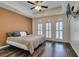 Spacious bedroom with a ceiling fan and large windows at 2405 W Serene Ave # 236, Las Vegas, NV 89123