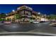 Night view of Lindbergh shopping center, featuring stores and street lights at 10032 Hope Island Dr, Las Vegas, NV 89134