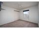 Bright bedroom featuring carpet flooring and a double door closet at 2003 Grafton Ave, Henderson, NV 89074