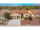 Aerial view of single-story house with two-car garage at 5860 Alfano Ave, Pahrump, NV 89061