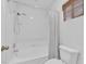 Clean bathroom with shower/tub combo and white tile at 4045 W Ford Ave, Las Vegas, NV 89139