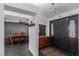 Bright entryway with a wooden dresser and view to dining room at 8225 Helena Ave, Las Vegas, NV 89129