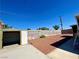 Backyard with storage shed and gravel landscaping at 5220 Del Rey Ave, Las Vegas, NV 89146