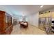 Formal dining room with wood table and chairs, and built-in hutch at 2309 Aztec Ruin Way, Henderson, NV 89044