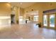 Open living room with high ceilings and tile floors at 26 Cerchio Alto, Henderson, NV 89011