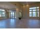 Spacious living room with high ceilings and large windows at 26 Cerchio Alto, Henderson, NV 89011