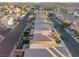 Aerial view of houses and street in a neighborhood at 7052 Coventry Glenn Rd, Las Vegas, NV 89148