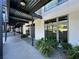 Modern hallway with large windows and plants at 8925 W Flamingo Rd # 121, Las Vegas, NV 89147