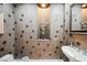 Stylish powder room with unique polka dot wallpaper at 11534 Glowing Sunset Ln, Las Vegas, NV 89135