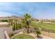 Landscaped backyard with golf course view at 11534 Glowing Sunset Ln, Las Vegas, NV 89135