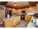 Well-equipped kitchen with island and granite countertops at 564 Campus Oaks Ct, Las Vegas, NV 89183