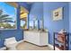 Bathroom with white vanity, toilet and tiled floor at 2200 Glenbrook Way, Las Vegas, NV 89117