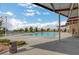 Relaxing community pool with surrounding patio and landscaping at 76 Summer Rhapsody Ave, Henderson, NV 89015