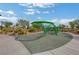 Modern playground with a rope climbing feature at 76 Summer Rhapsody Ave, Henderson, NV 89015