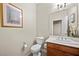 Clean bathroom with toilet, sink, and vanity at 3324 Tranquil Garden St, Las Vegas, NV 89117