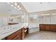 Bathroom with double sinks, soaking tub and lots of light at 3324 Tranquil Garden St, Las Vegas, NV 89117